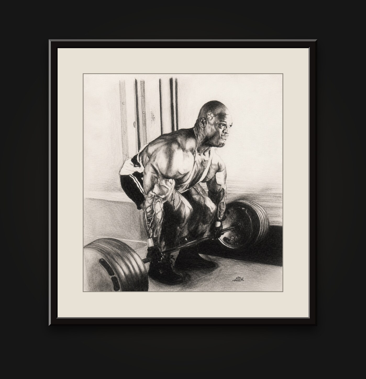 Graphite drawing of bodybuilder Ronnie Coleman set over a loaded barbell at the bottom of a deadlift — shown framed on a gallery wall